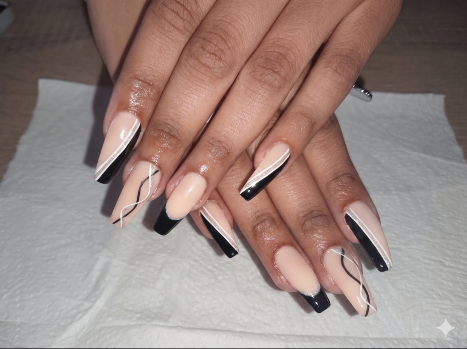 Black and nude coffin nails with silver detailing