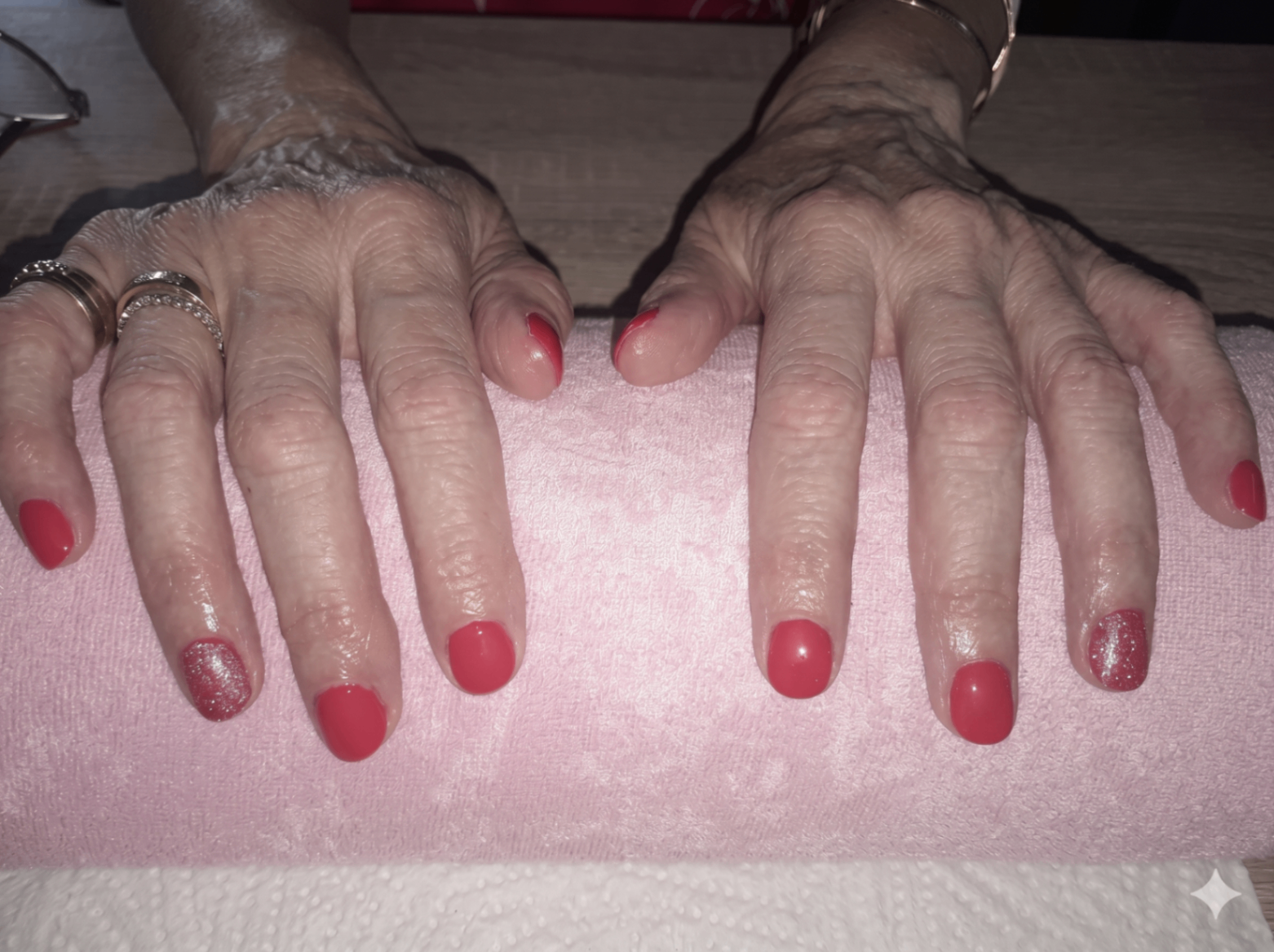 Coral-red gel manicure